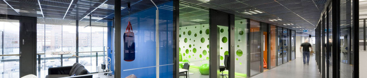 Full height glass partitions and open cell ceiling